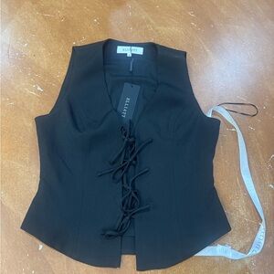 Black Lace-Up Vest by Elliatt